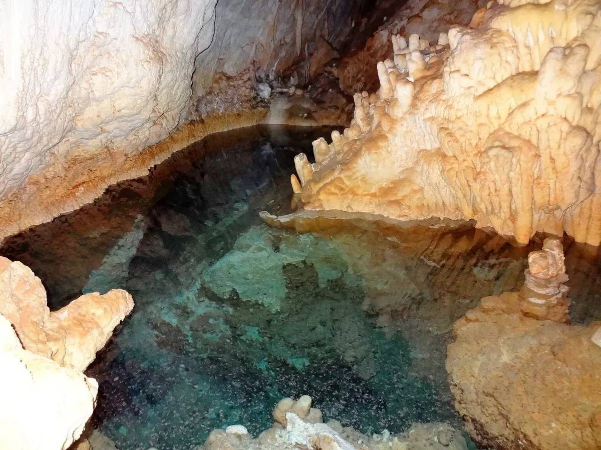 Entrance to a karst cave in the Cala Varques area